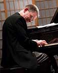 George plays the piano